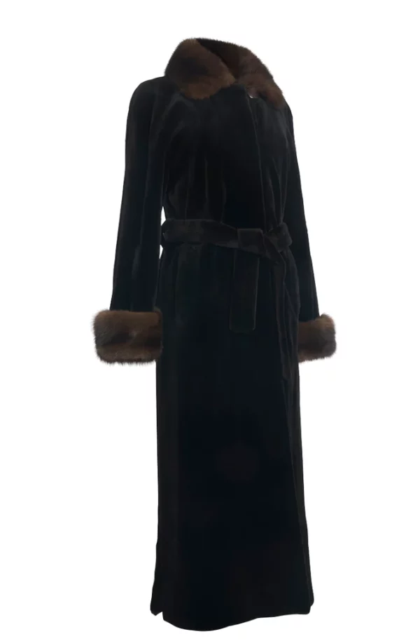 A black coat with brown fur on its collar and cuffs