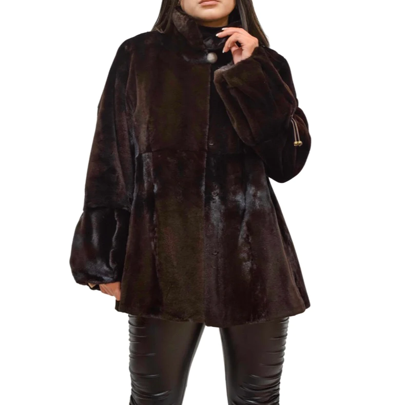 Woman wearing a brown sheared mink jacket