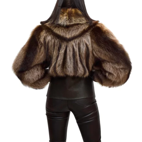 Back view of a black leather coat with raccoon fur