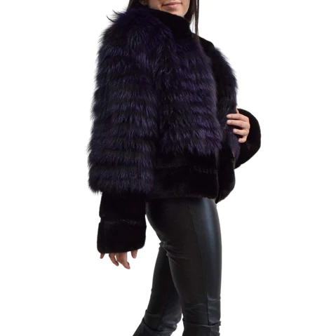 side view of a woman wearing a purple mink and fox fur jacket