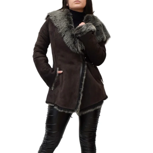Woman posing while wearing a Toscana jacket that is lined in fur