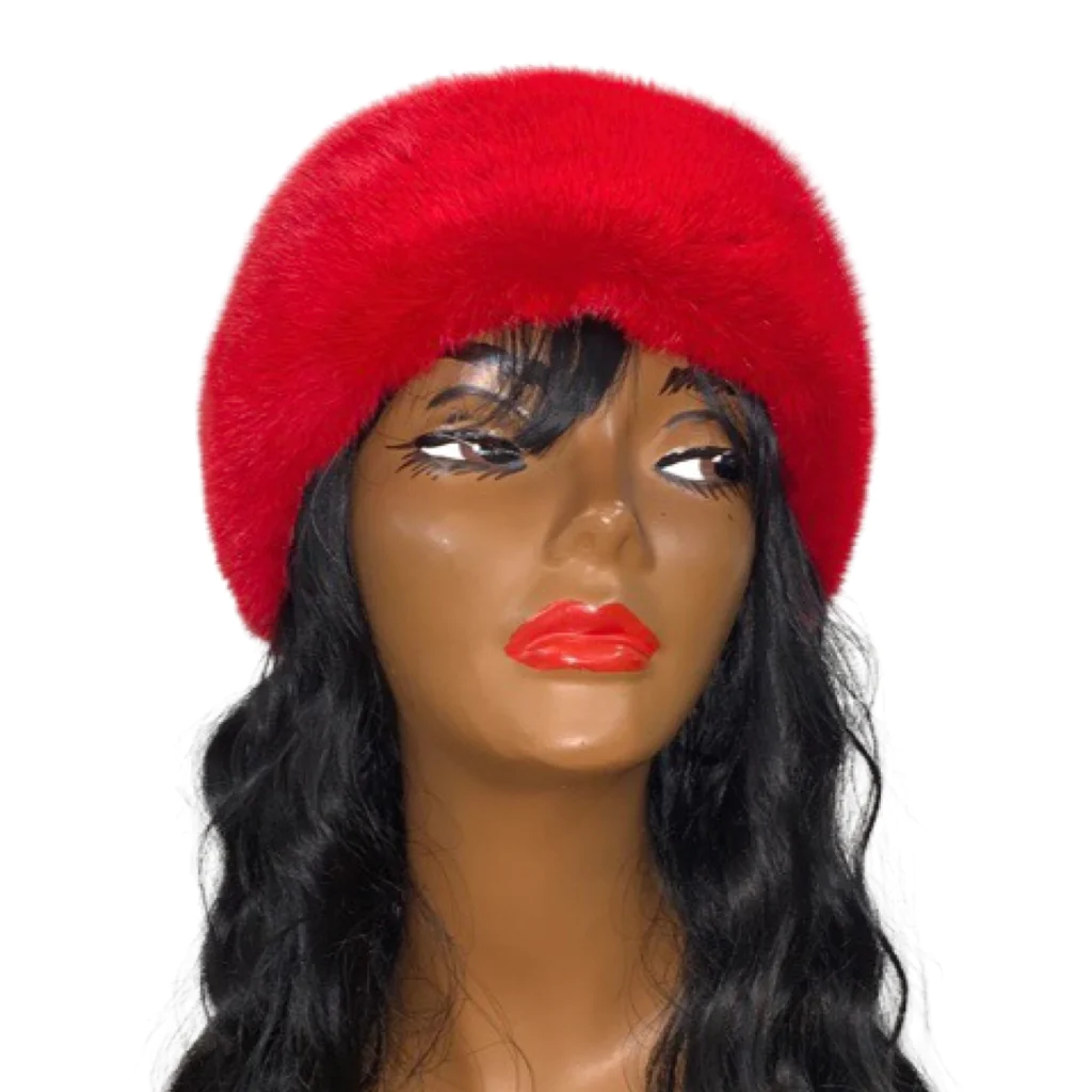 A mannequin wearing a red mink fur headband